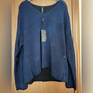 Gorgeous Marc Cain sweater in mesmerizing colors.  Size 41 Medium